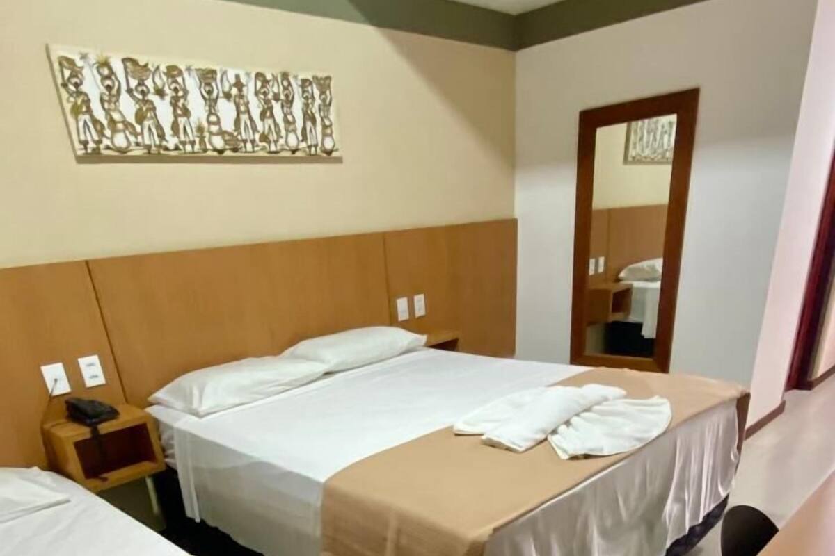 Standard Triple Room | Minibar, in-room safe, blackout drapes, iron/ironing board (on request)