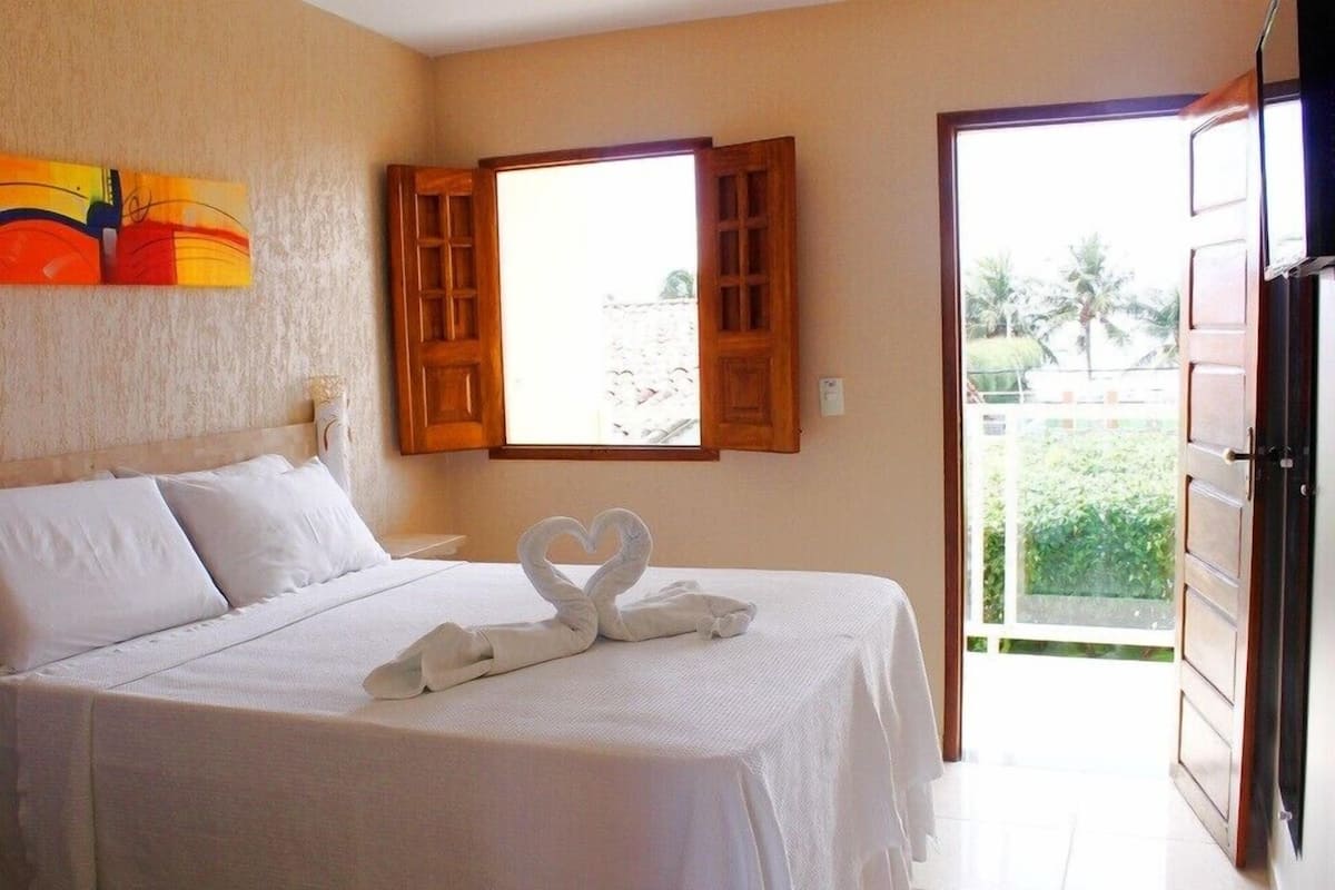 Deluxe Room, Beach View | 1 bedroom, minibar, individually decorated, individually furnished
