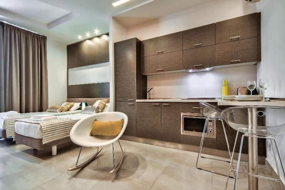 Iron/ironing board, cribs (free), WiFi (free)