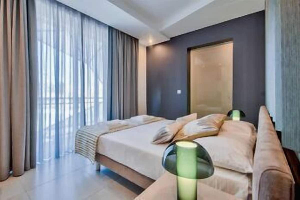 Executive Suite, 2 Bedrooms | Iron/ironing board, free cots/infant beds, free WiFi