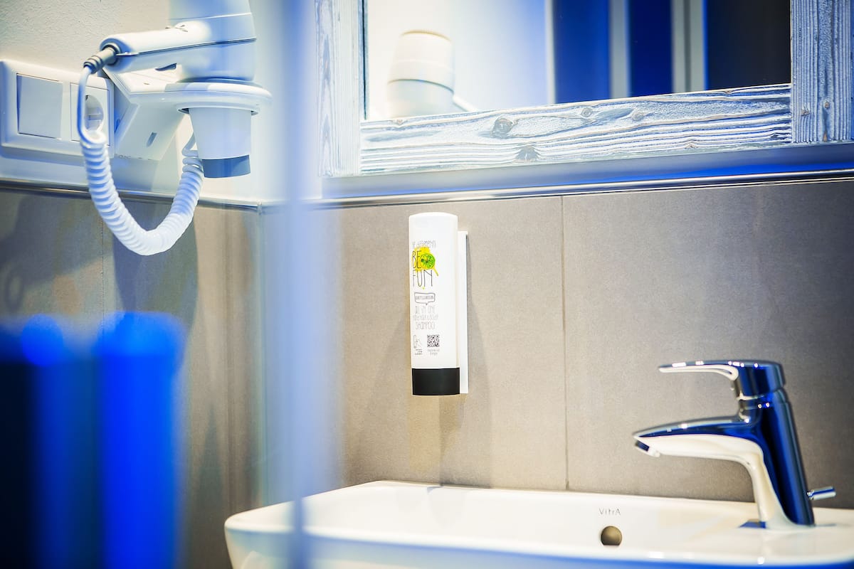 mini bude | bathroom amenities | shower, hair dryer, heated floors, towels