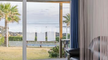 Family Quadruple Room | Living area | 40-inch flat-screen TV with cable channels, TV, heated floors