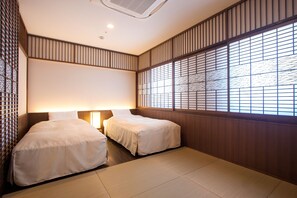 Japanese Style Twin Room, Non Smoking | Iron/ironing board, free WiFi, bed sheets