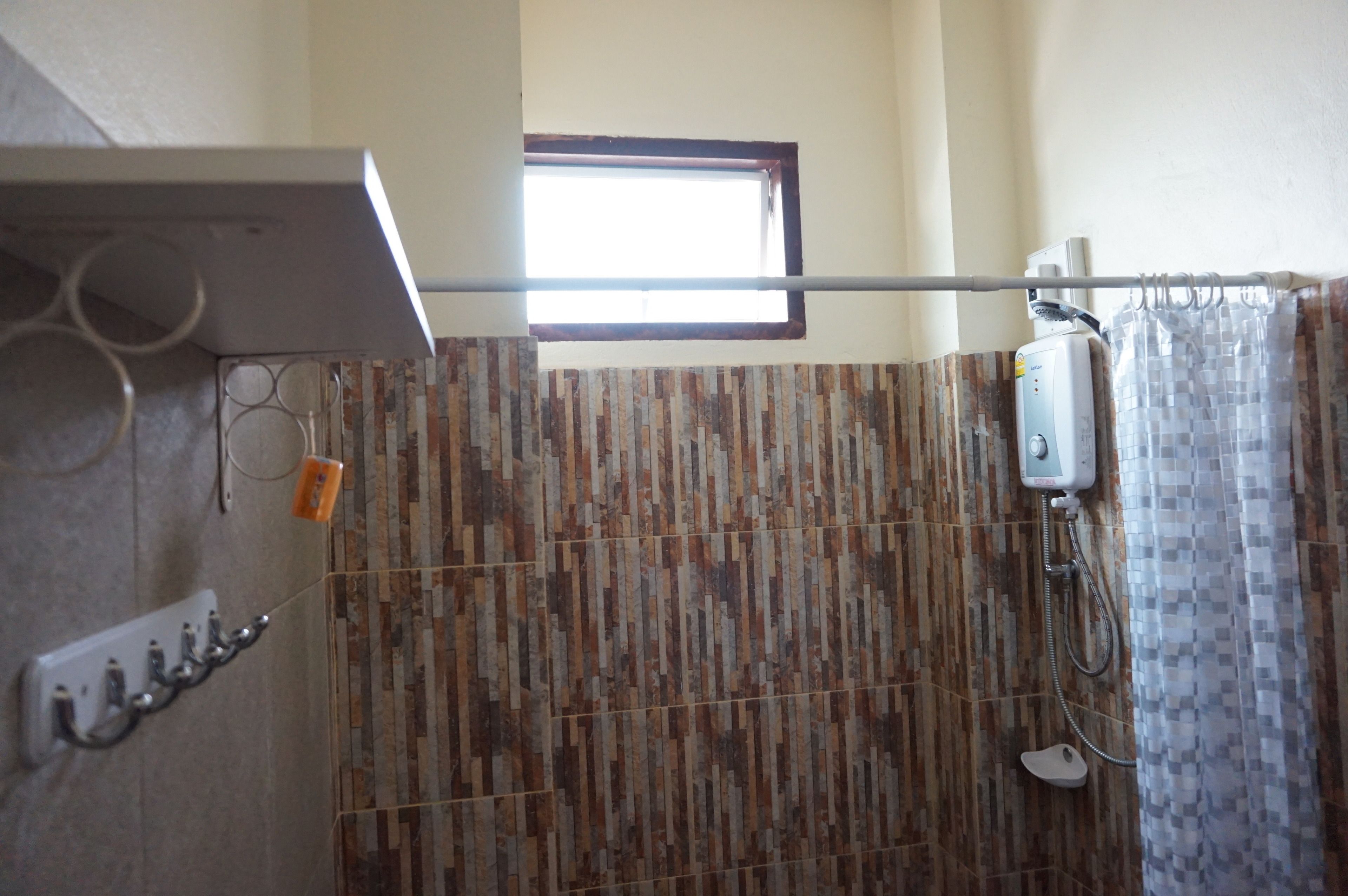 shower, free toiletries, hair dryer, slippers