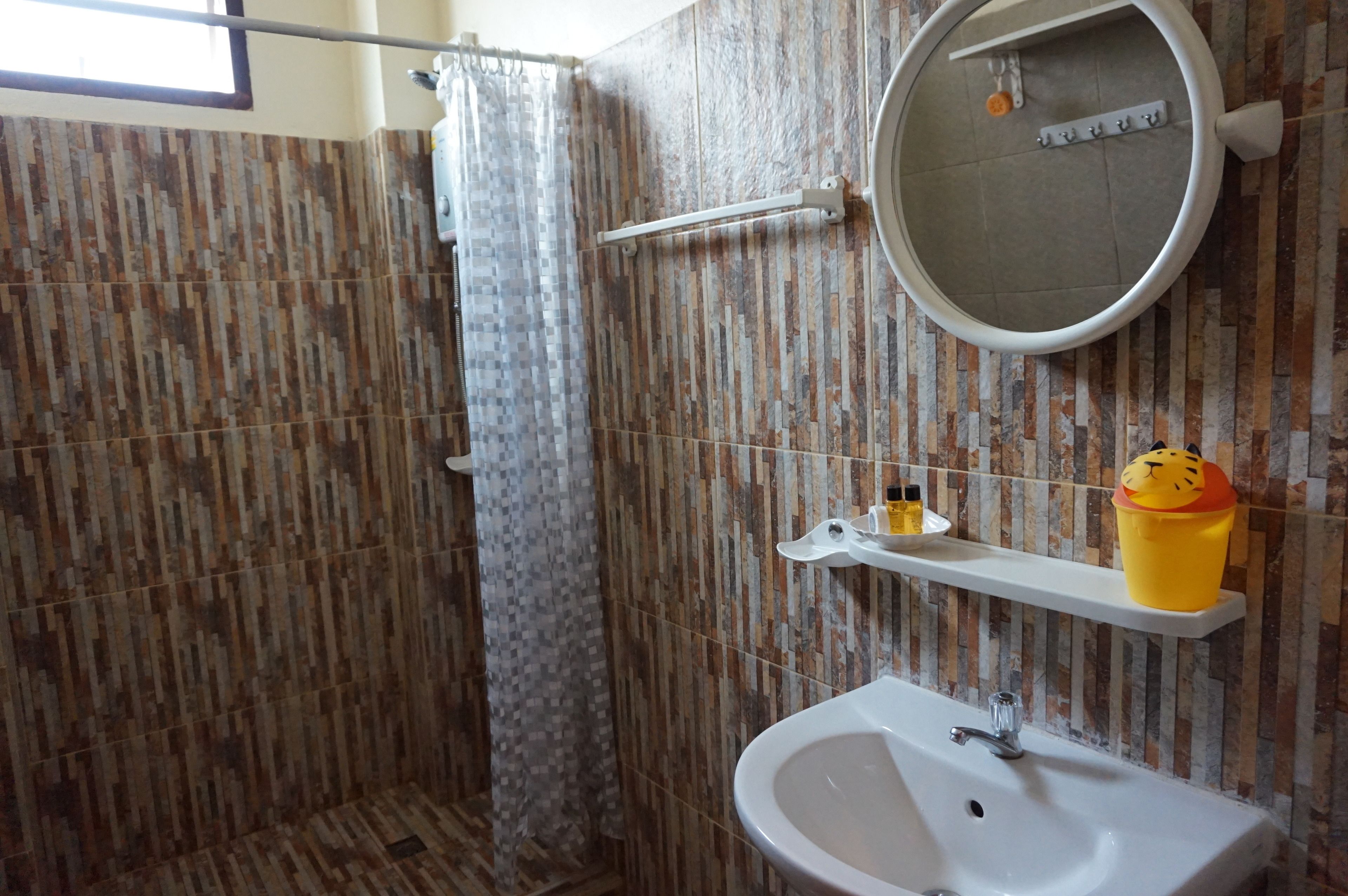 shower, free toiletries, hair dryer, slippers