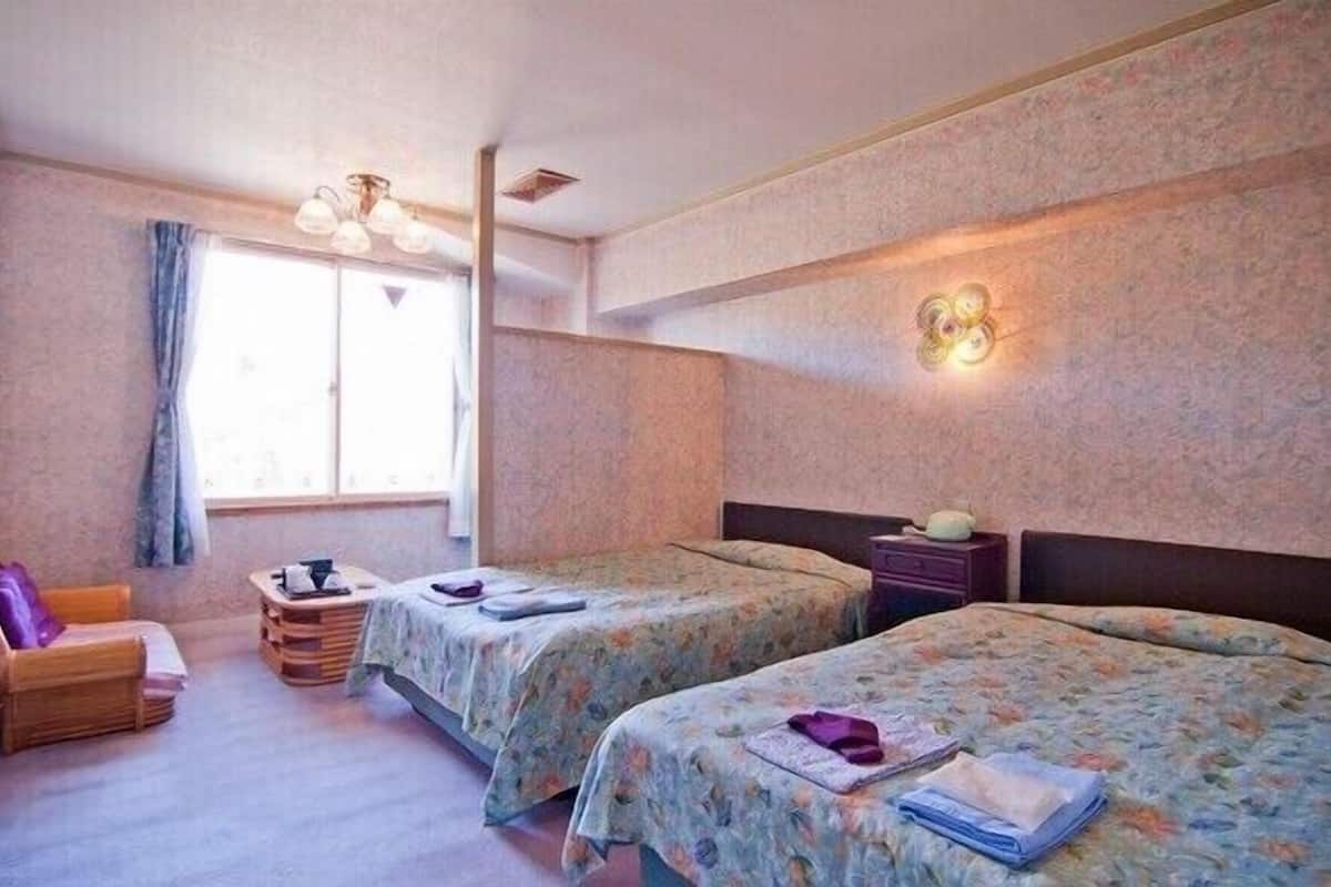 In-room safe, desk, blackout curtains, iron/ironing board (on request)