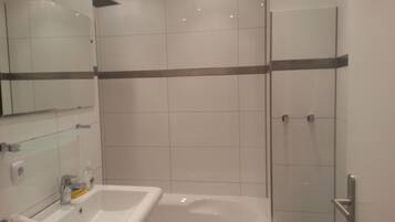 Studio, 1 Bedroom, Park View | Bathroom | Shower, rainfall showerhead, hair dryer, towels