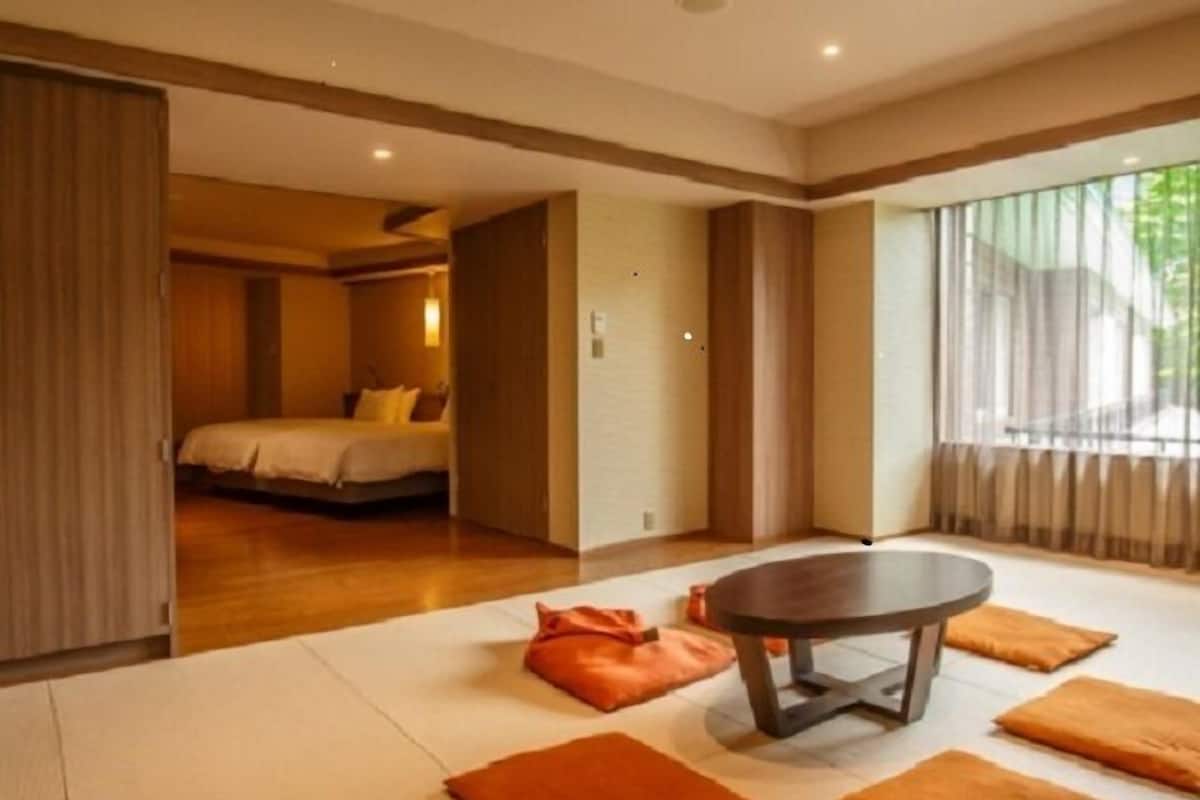 main building,standard japanese western room (67sqm), non-smoking | in-room safe, desk, laptop workspace, iron/ironing board