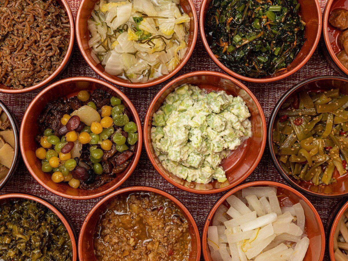 A variety of dishes in traditional clay bowls.