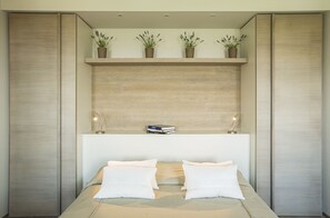 1 غرفة نوم وخزنة داخل الغرفة وستائر تعتيم ومكواة/لوح كي