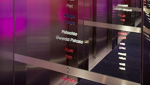 An elevator with glass panels and floor numbers 0 to 2. - The Bull and Townhouse, Beaumaris- The Inn Collection Group (Beaumaris)