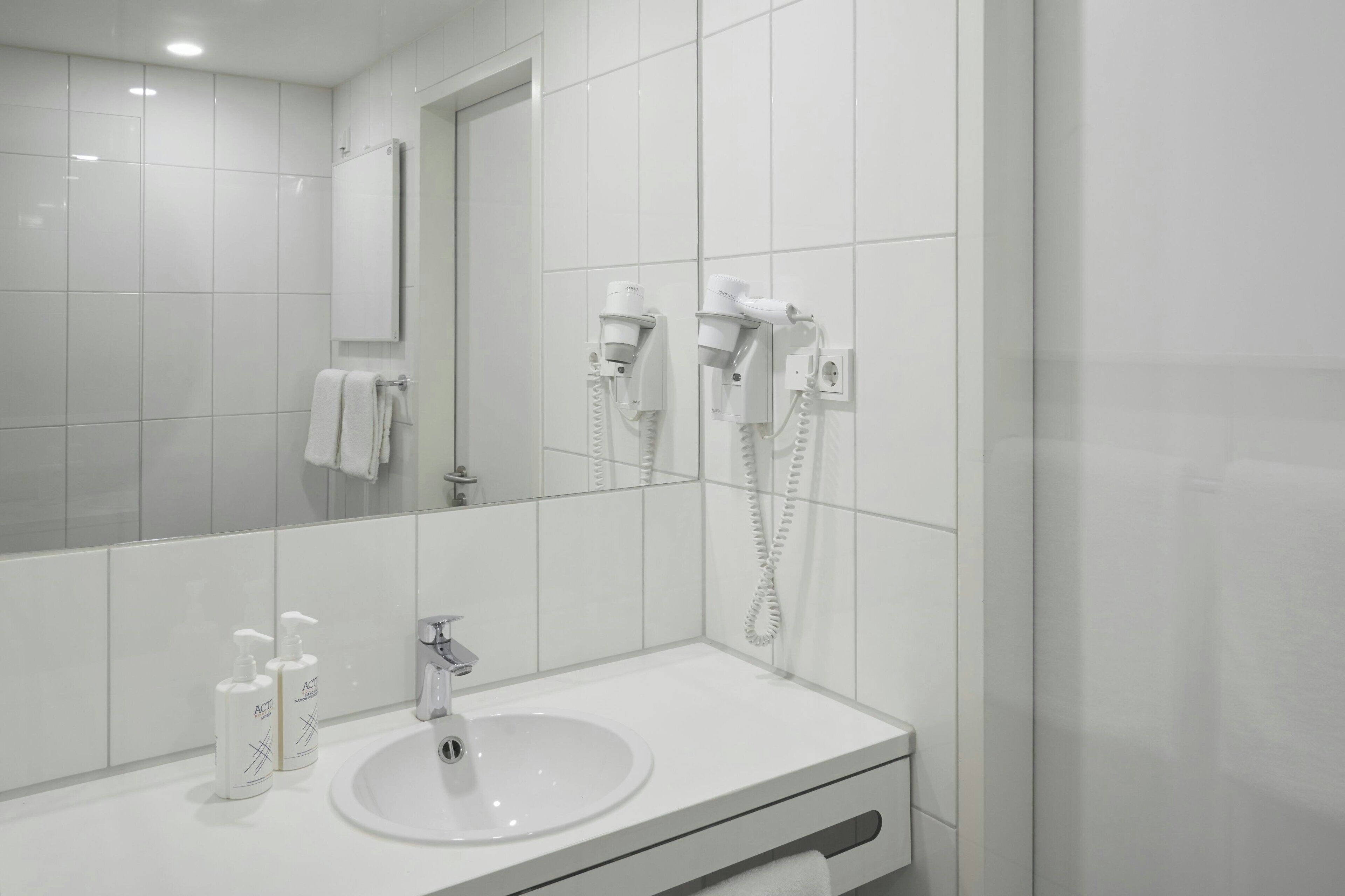 shower, eco-friendly toiletries, hair dryer, towels