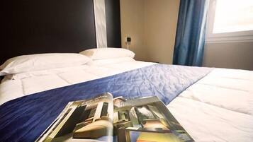 Habitación estándar con 1 cama matrimonial o 2 individuales | Ropa de cama hipoalergénica y minibar