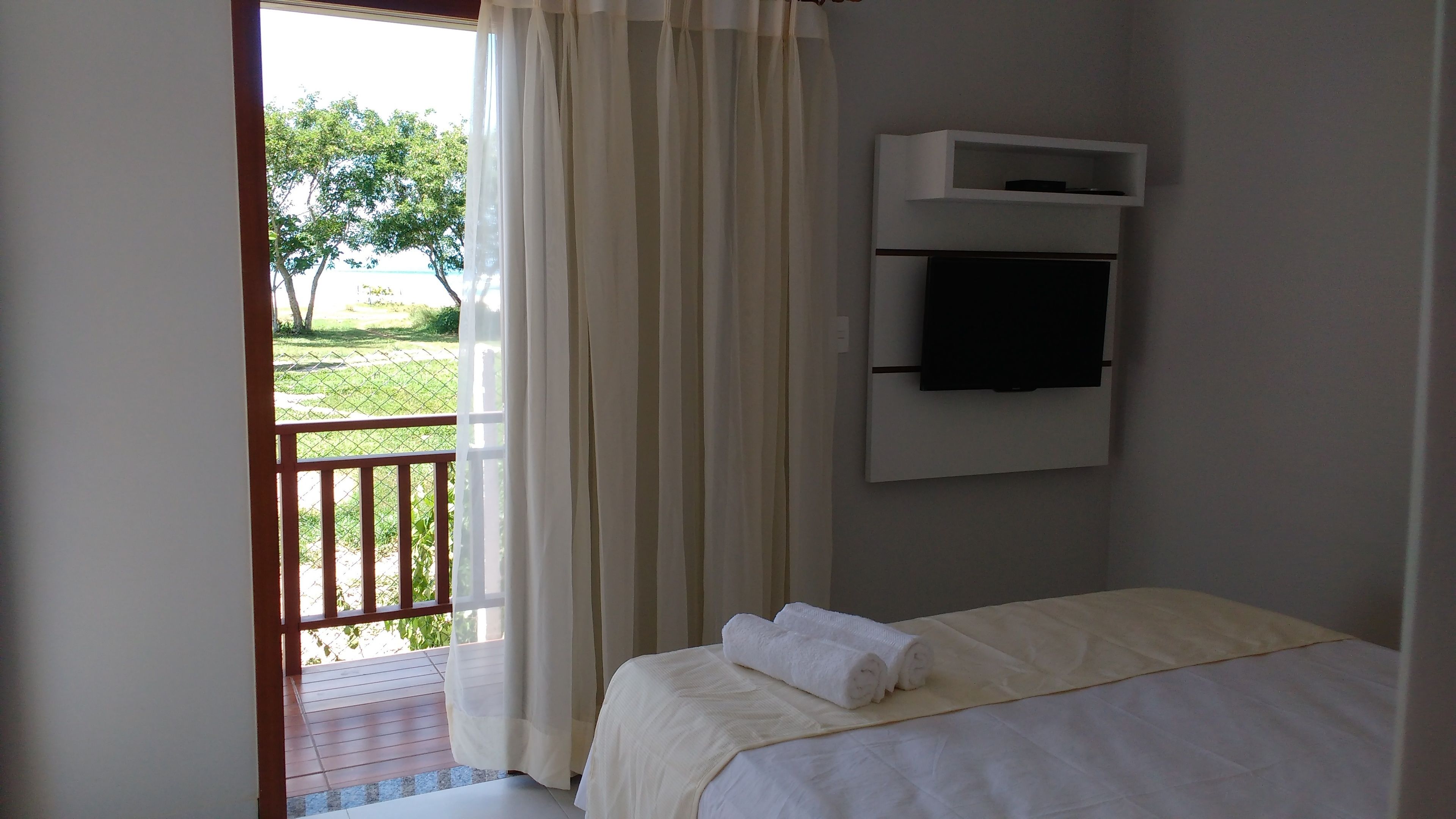 Habitación, vistas a la playa | Minibar, caja fuerte, escritorio y wifi gratis