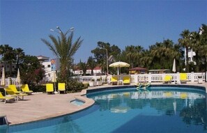 Outdoor pool, pool umbrellas, pool loungers