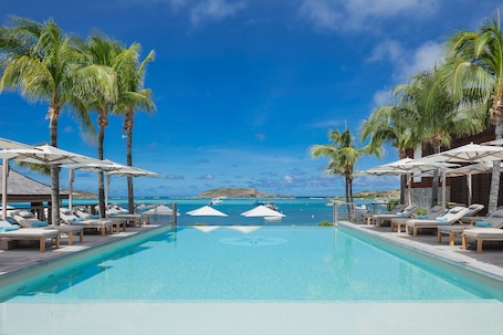 Outdoor pool, open 8:00 AM to 9:00 PM, pool umbrellas, pool loungers