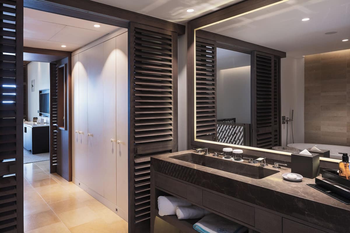 eco-friendly toiletries, hair dryer, bathrobes, slippers