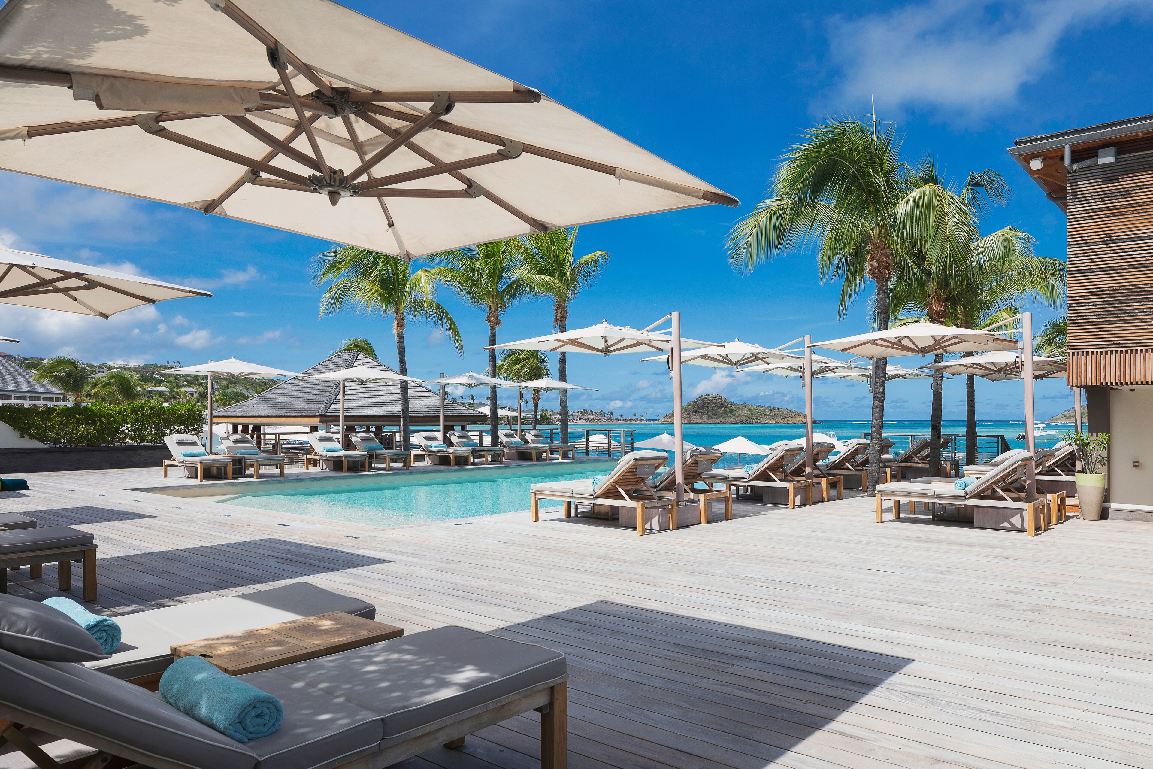 outdoor pool, open 8:00 am to 9:00 pm, pool umbrellas, pool loungers