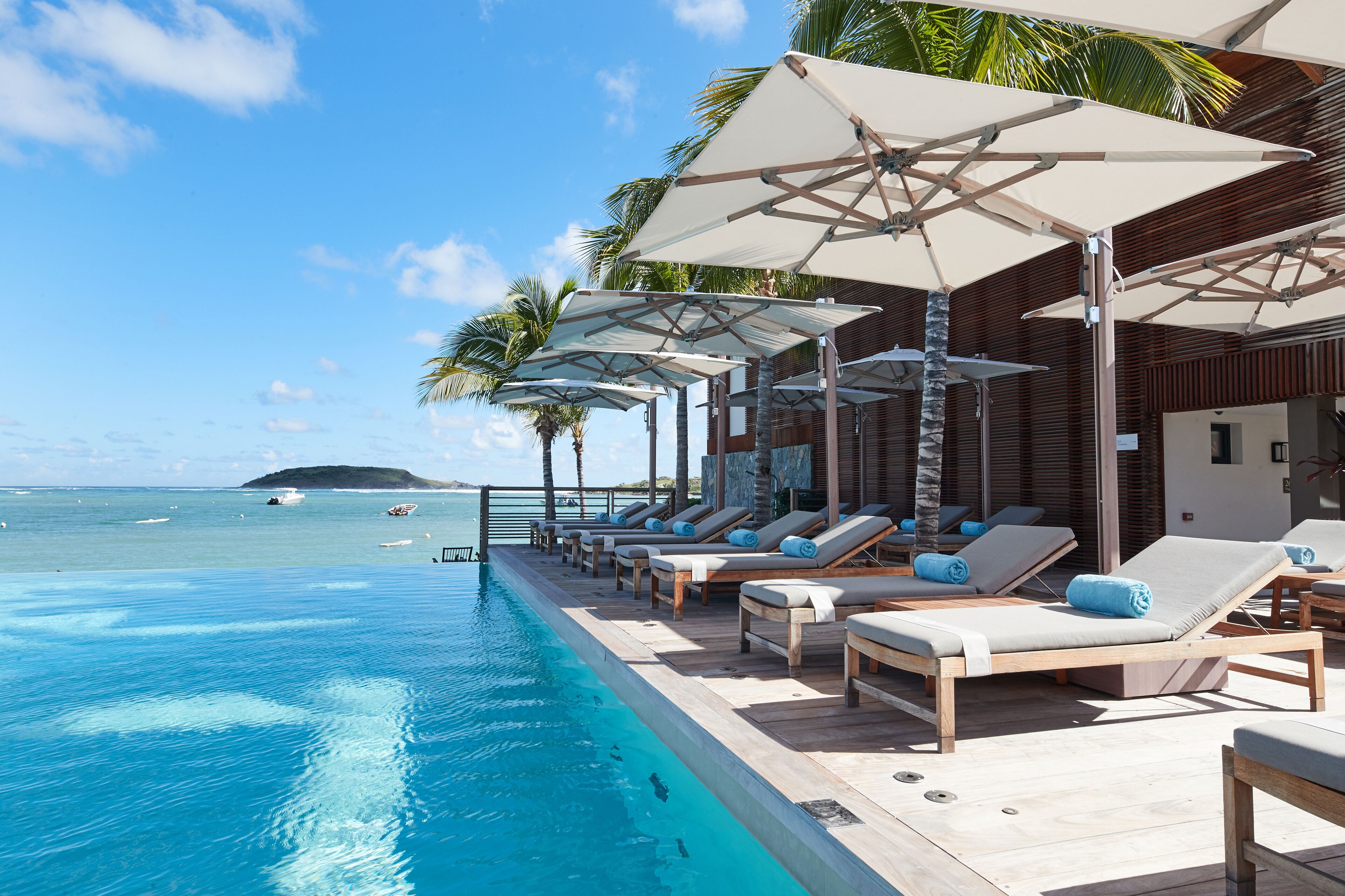 outdoor pool, open 8:00 am to 9:00 pm, pool umbrellas, pool loungers