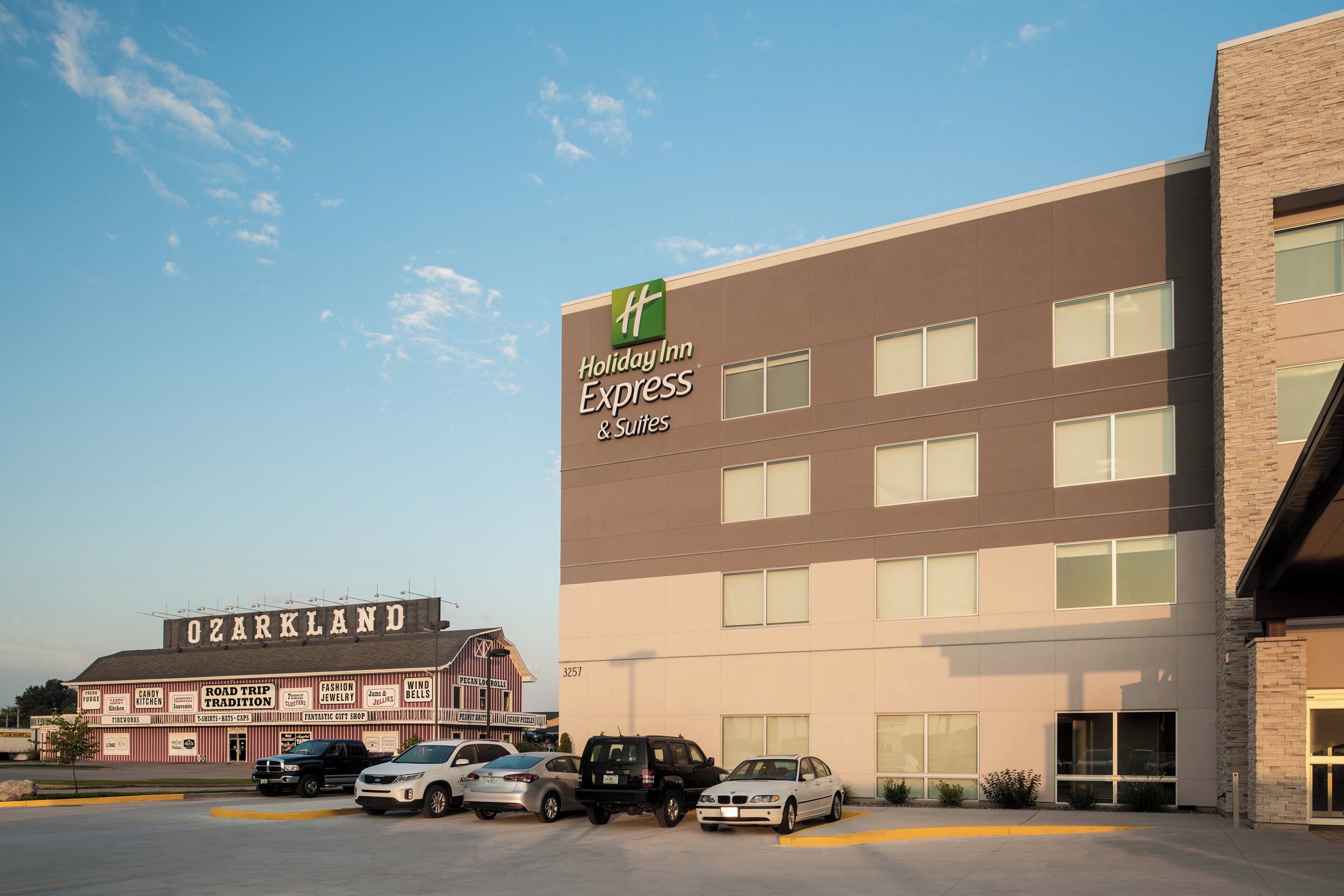 A Holiday Inn Express building with a clear sky.