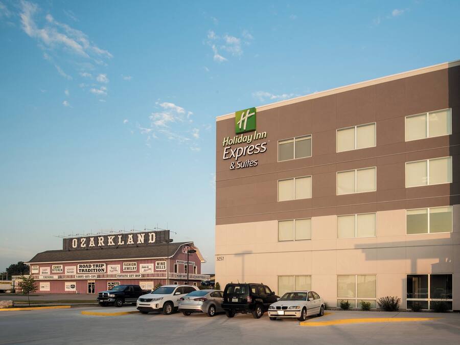 A Holiday Inn Express building with a clear sky.