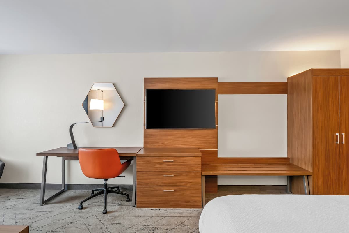 Suite, 1 King Bed | Desk, blackout drapes, iron/ironing board, cribs/infant beds