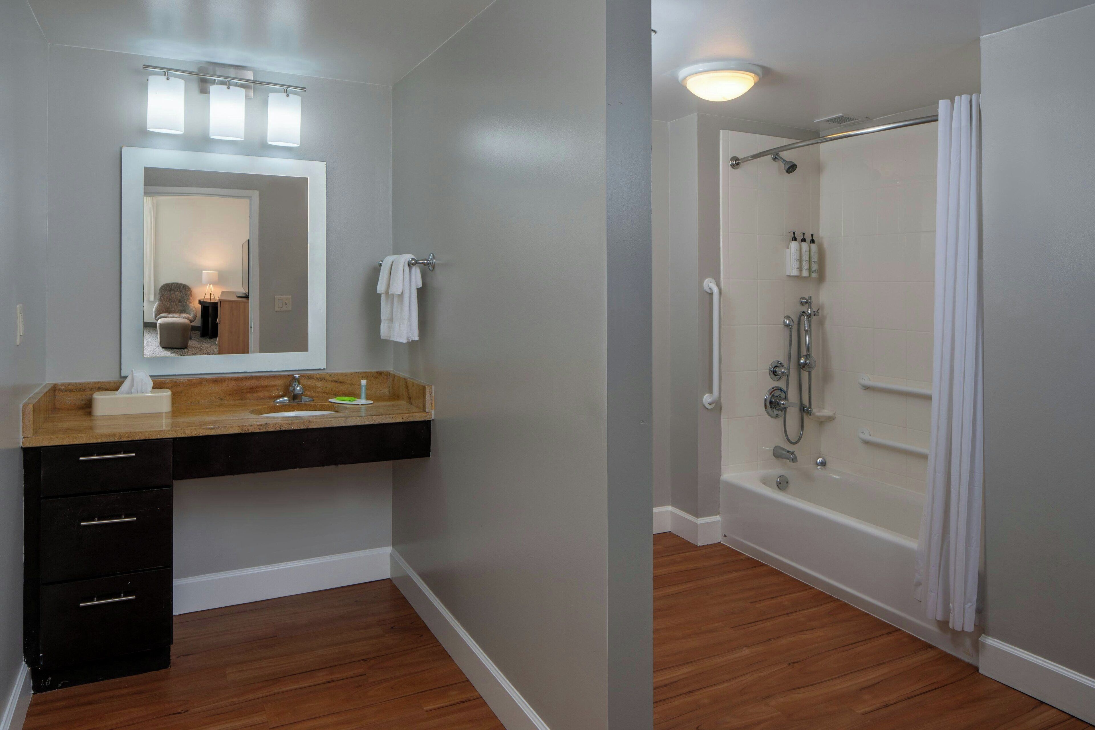 suite, 2 bedrooms | bathroom | combined shower/bathtub, designer toiletries, hair dryer, towels