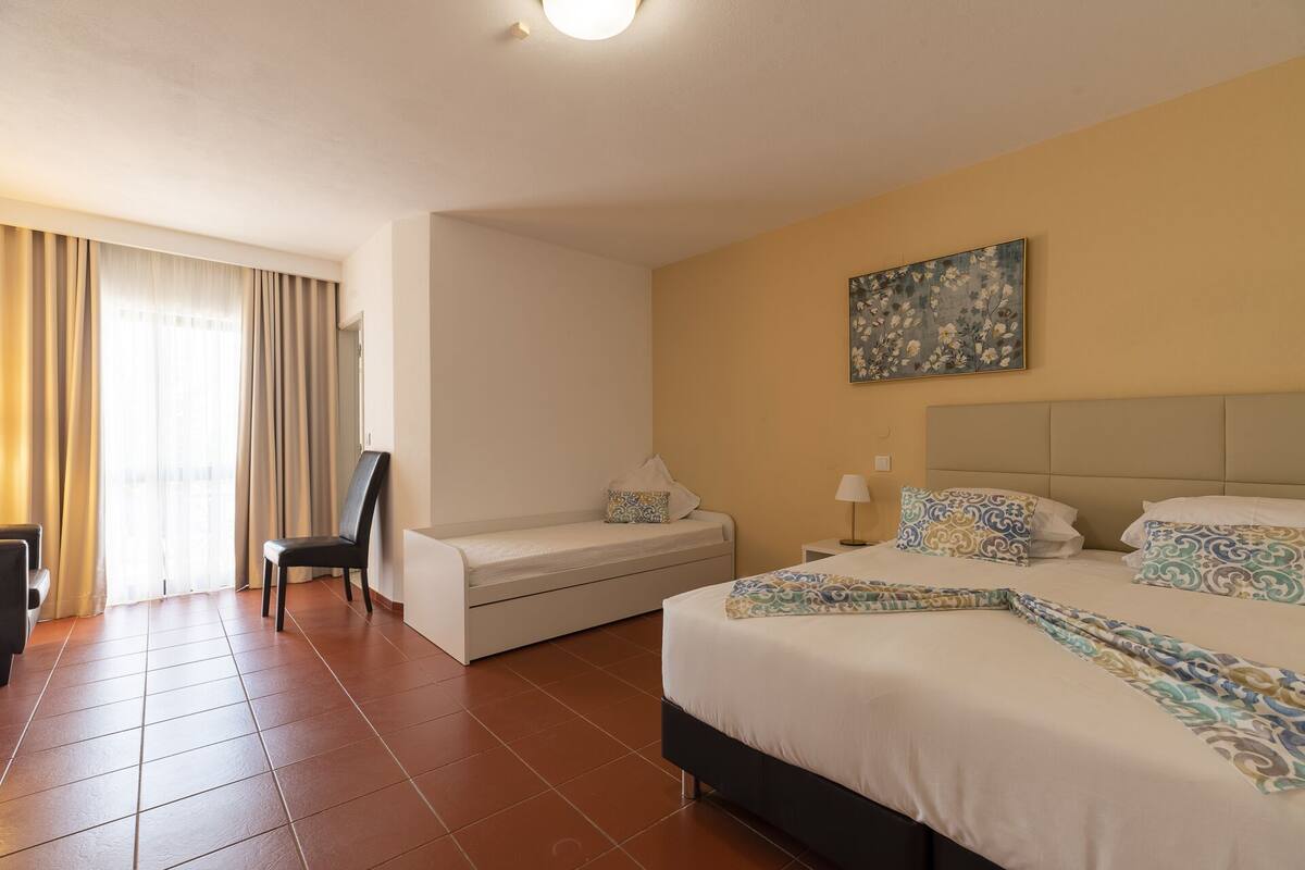 Minibar, desk, blackout curtains, iron/ironing board (on request)