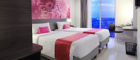 Chambre Deluxe | Coffre-fort, bureau, accĂšs au Wi-Fi (inclus), literie fournie