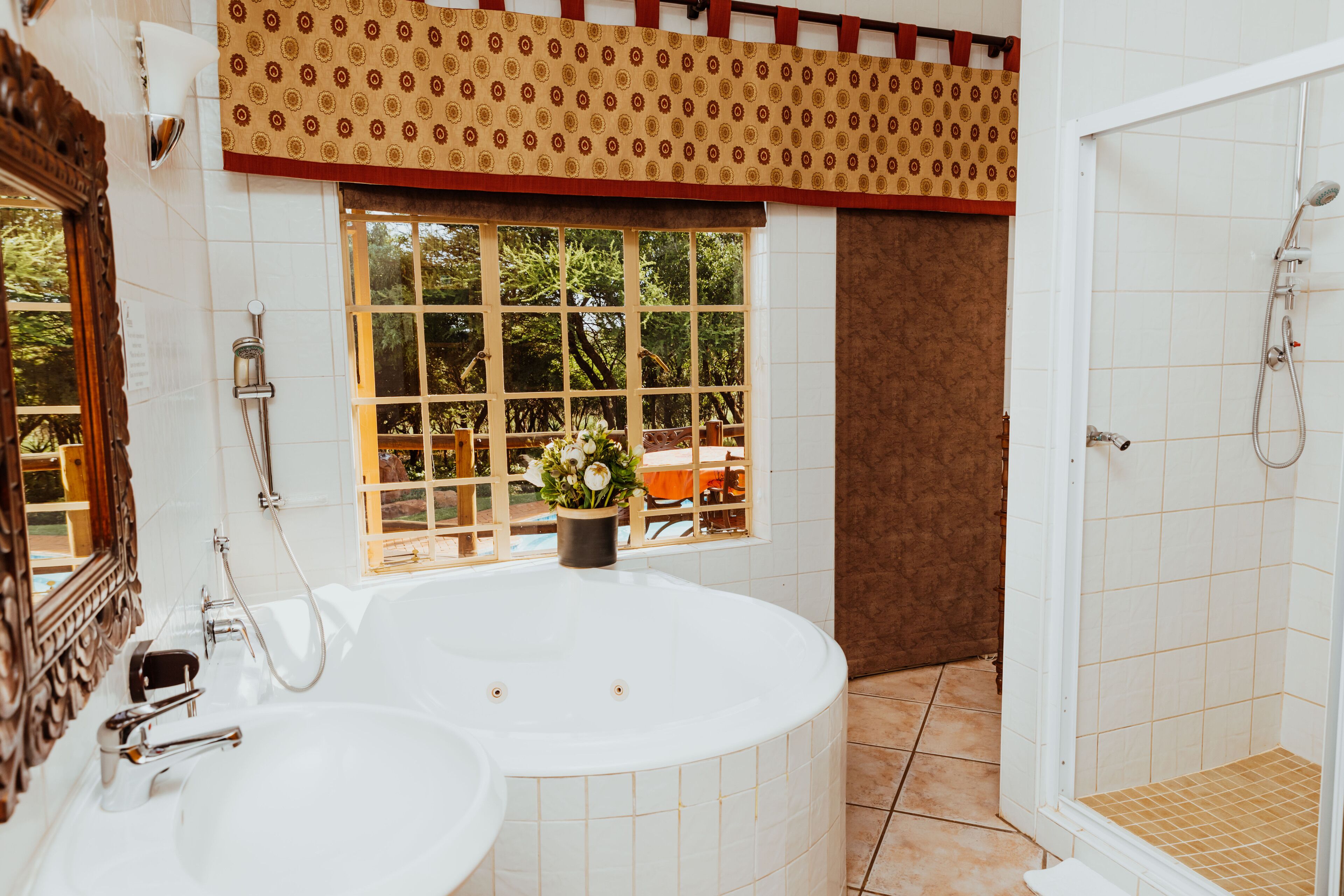 Southern Boubou Room | Bathroom | Free toiletries, bathrobes, slippers, towels