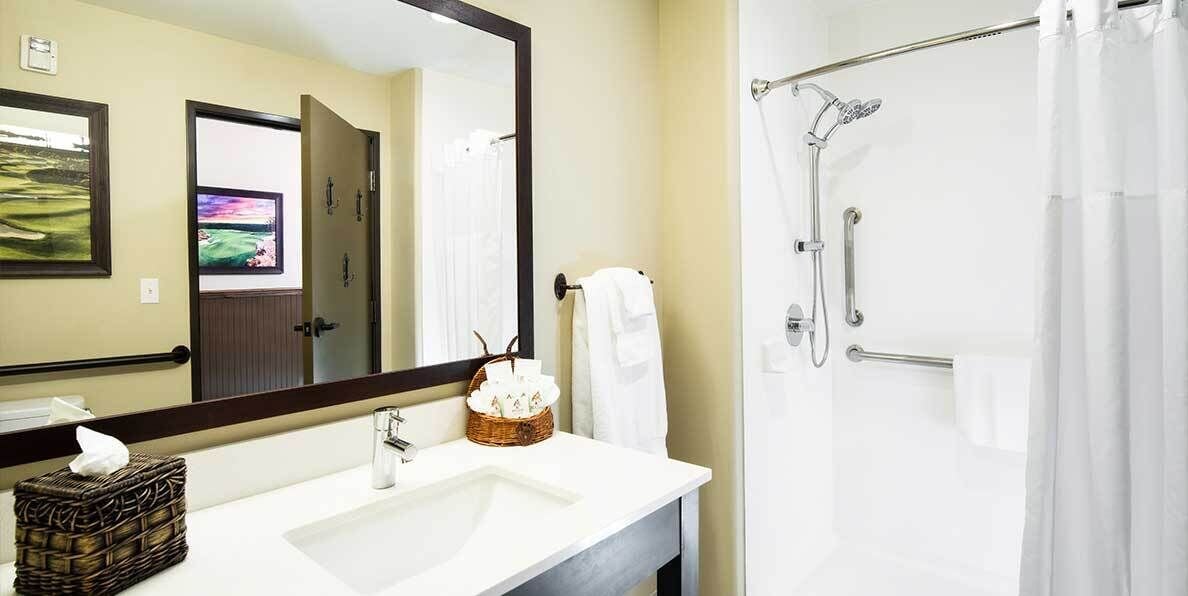 double queen ada | bathroom | shower, free toiletries, hair dryer, towels