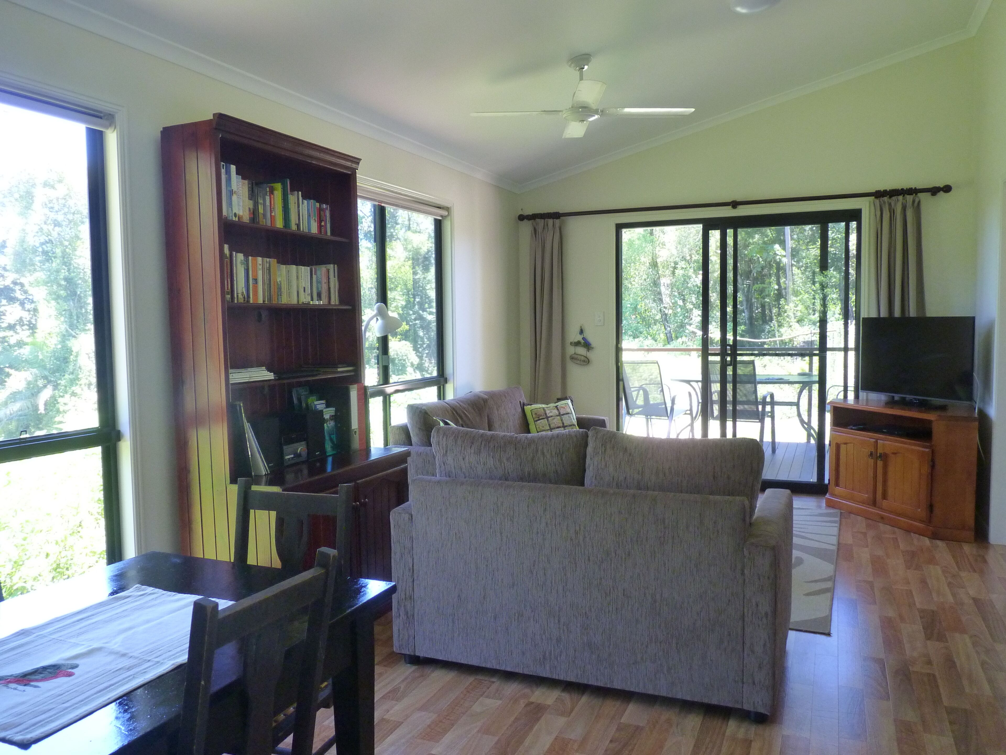 Bower Bird Cabin | Living area | 42-inch flat-screen TV with digital channels, TV, fireplace