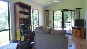 Bower Bird Cabin | Living area | 42-inch flat-screen TV with digital channels, TV, fireplace
