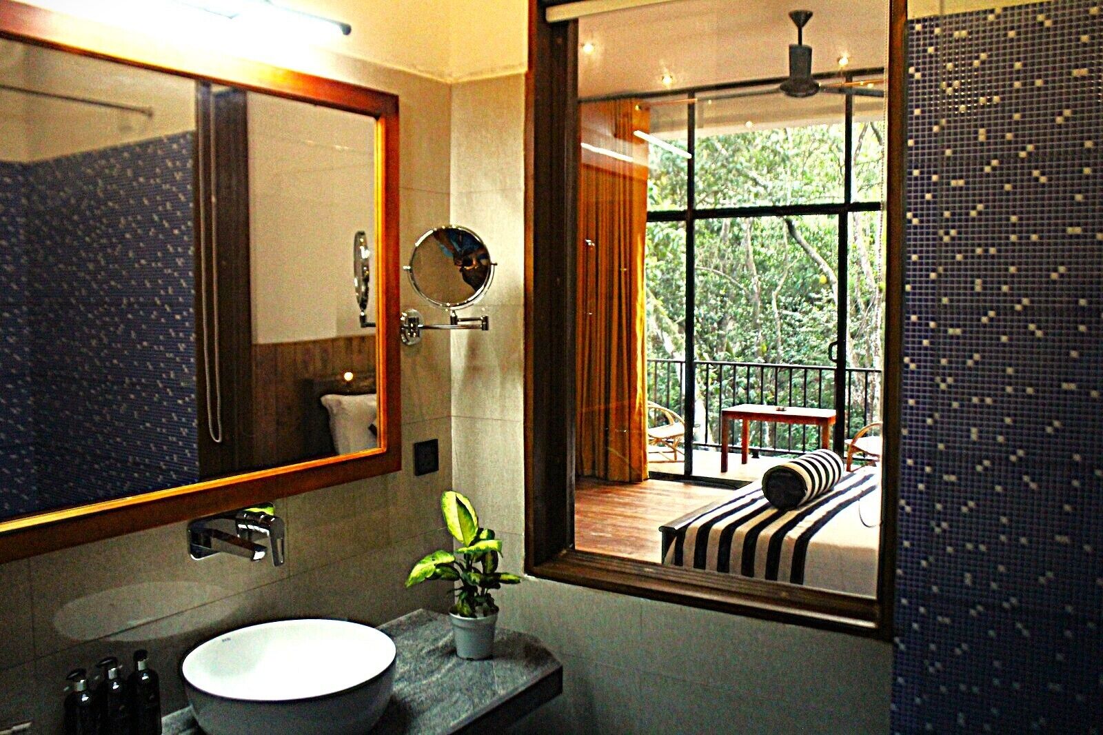 Deluxe Double Room, 1 Bedroom, Balcony, Garden View | Bathroom | Shower, rainfall showerhead, free toiletries, hair dryer