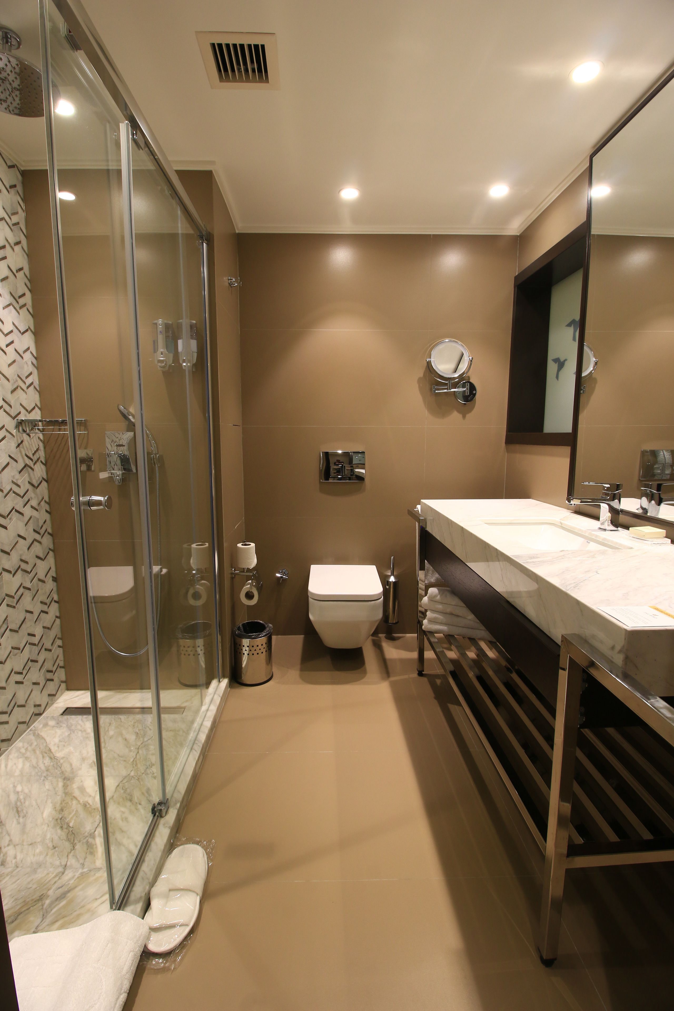 shower, rainfall showerhead, designer toiletries, hair dryer