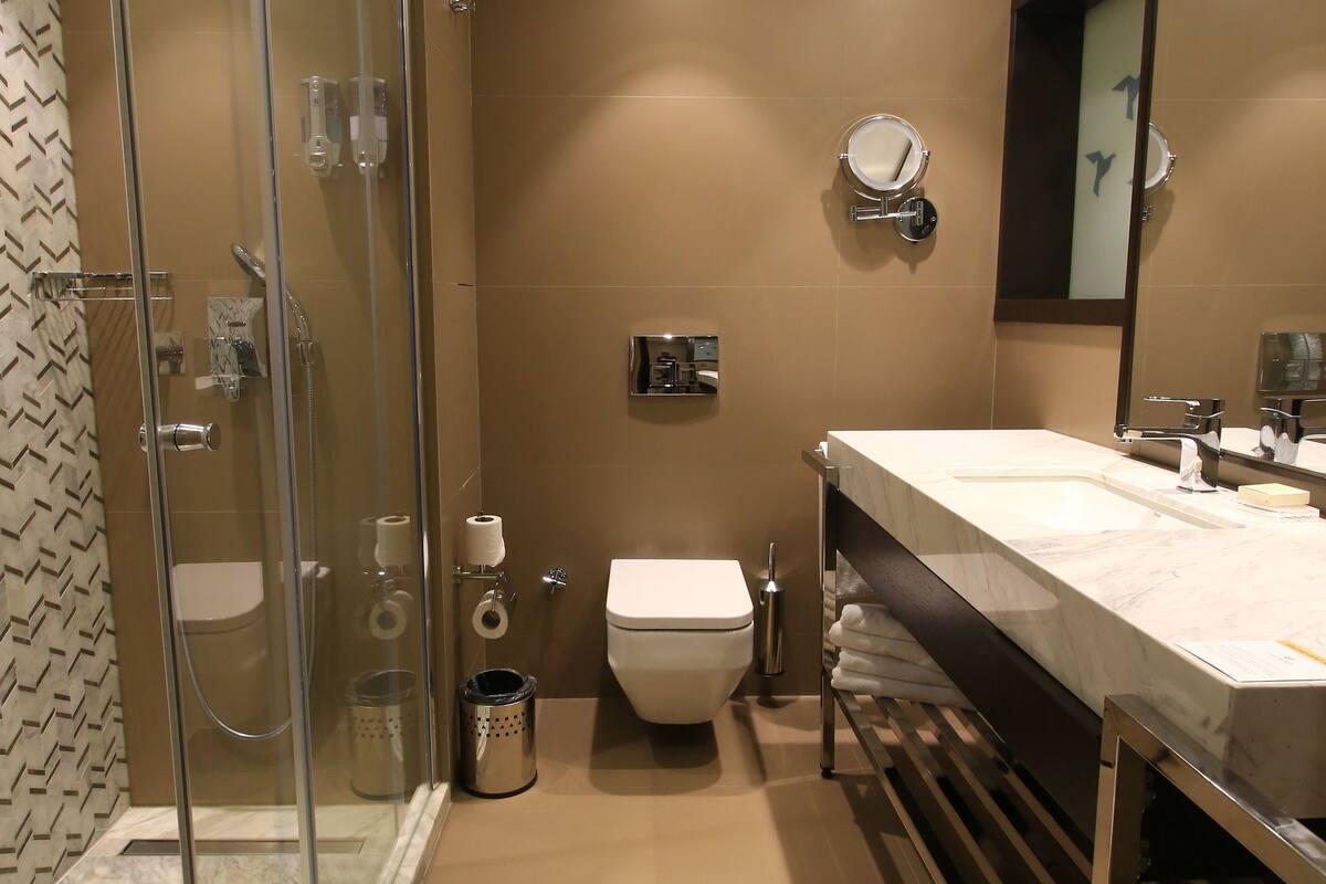 shower, rainfall showerhead, designer toiletries, hair dryer