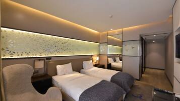 Habitación superior con 2 camas individuales | Ropa de cama de alta calidad y minibar