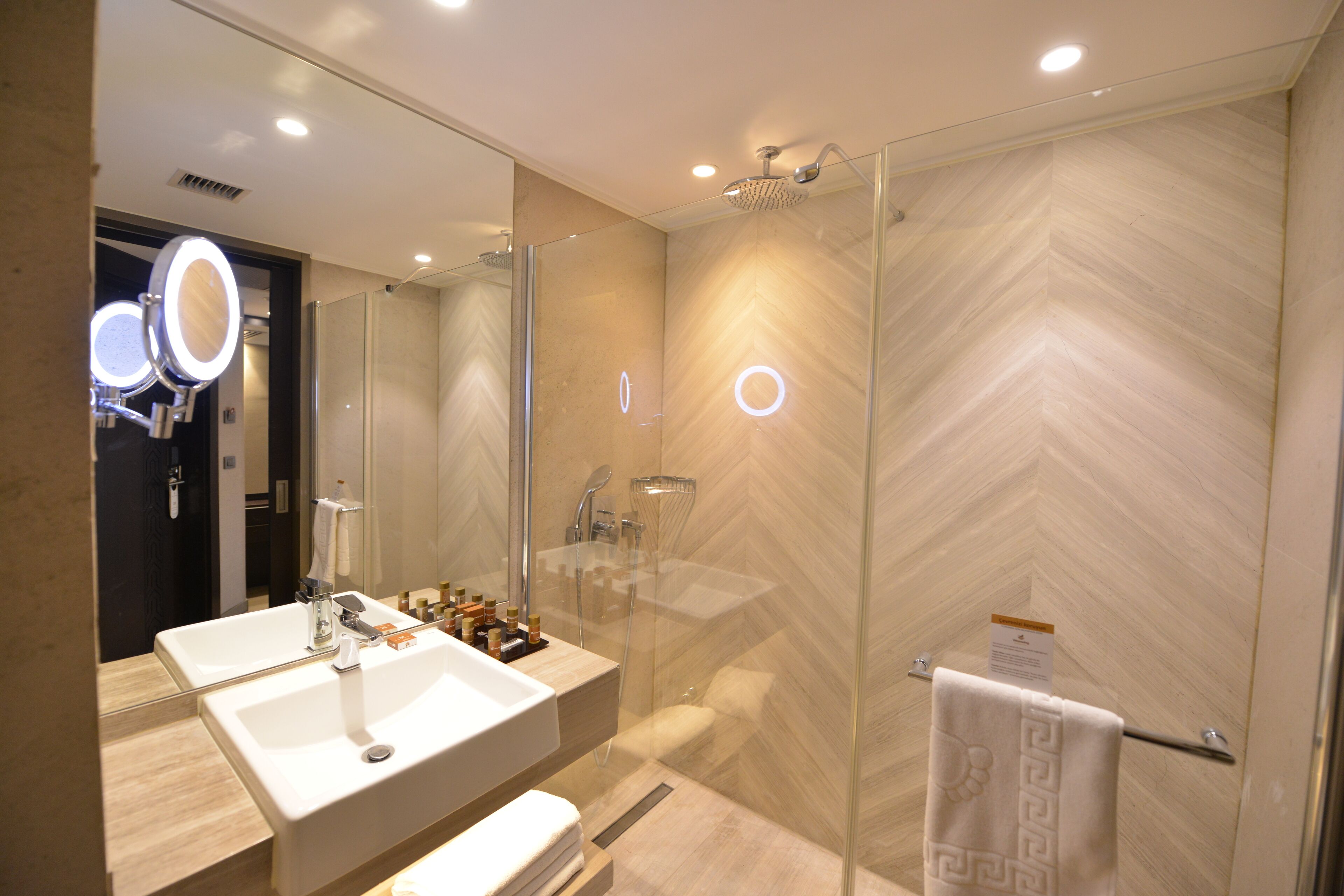 superior twin room | bathroom | shower, rainfall showerhead, designer toiletries, hair dryer