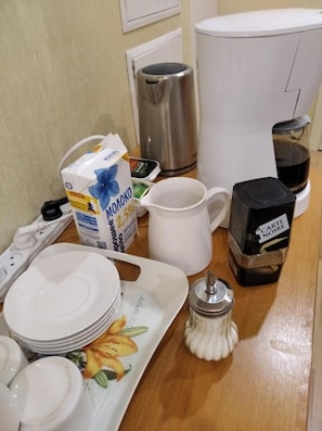 Fridge, microwave, cookware/dishes/utensils