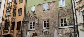 Golden Roof Apartments by Penz