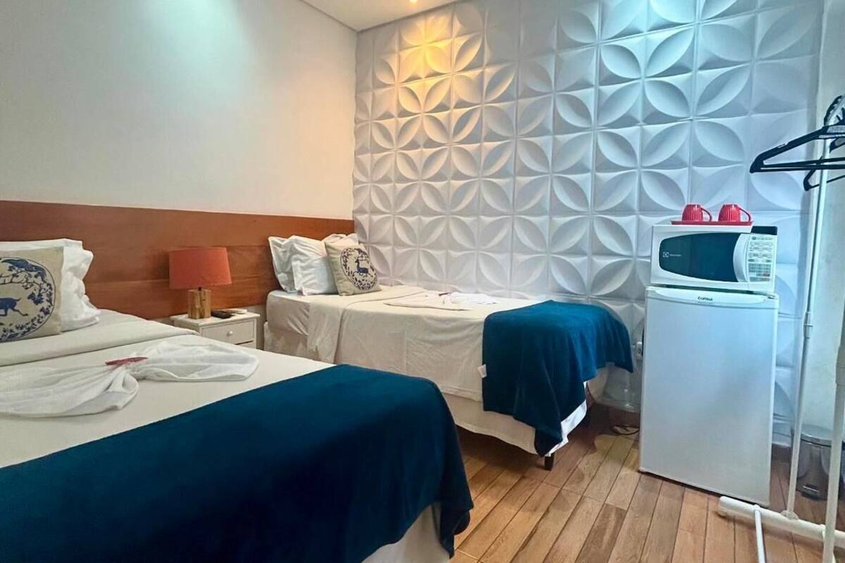 Economy Room | Minibar, tende oscuranti, Wi-Fi gratuito