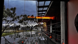 A view from inside a building, looking out through a window. - Serene Gray (Wujie)