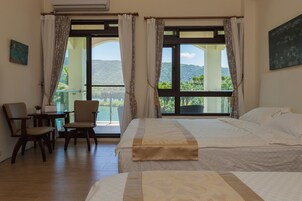 Family Quadruple Room, Lake View | Premium bedding, minibar, desk, blackout drapes