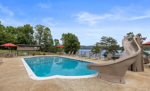 Seasonal outdoor pool, open 9 AM to 8 PM, pool loungers - Sun Castle Resort (Lake George)
