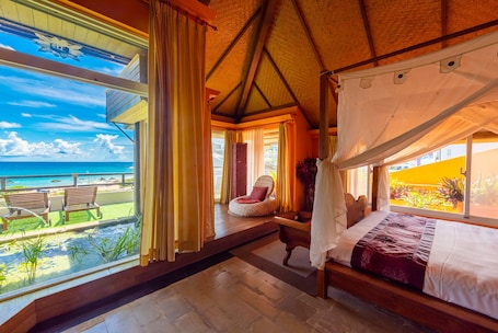 Penthouse Suite(For 2 adults only) | Down comforters, individually decorated, desk, blackout drapes