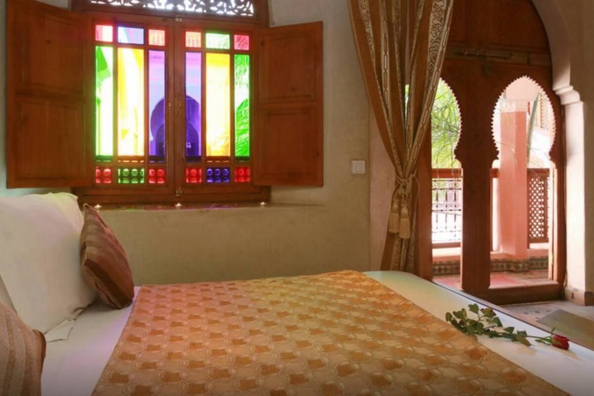 Deluxe Quadruple Room, Multiple Beds, Refrigerator, Pool View | Room amenity