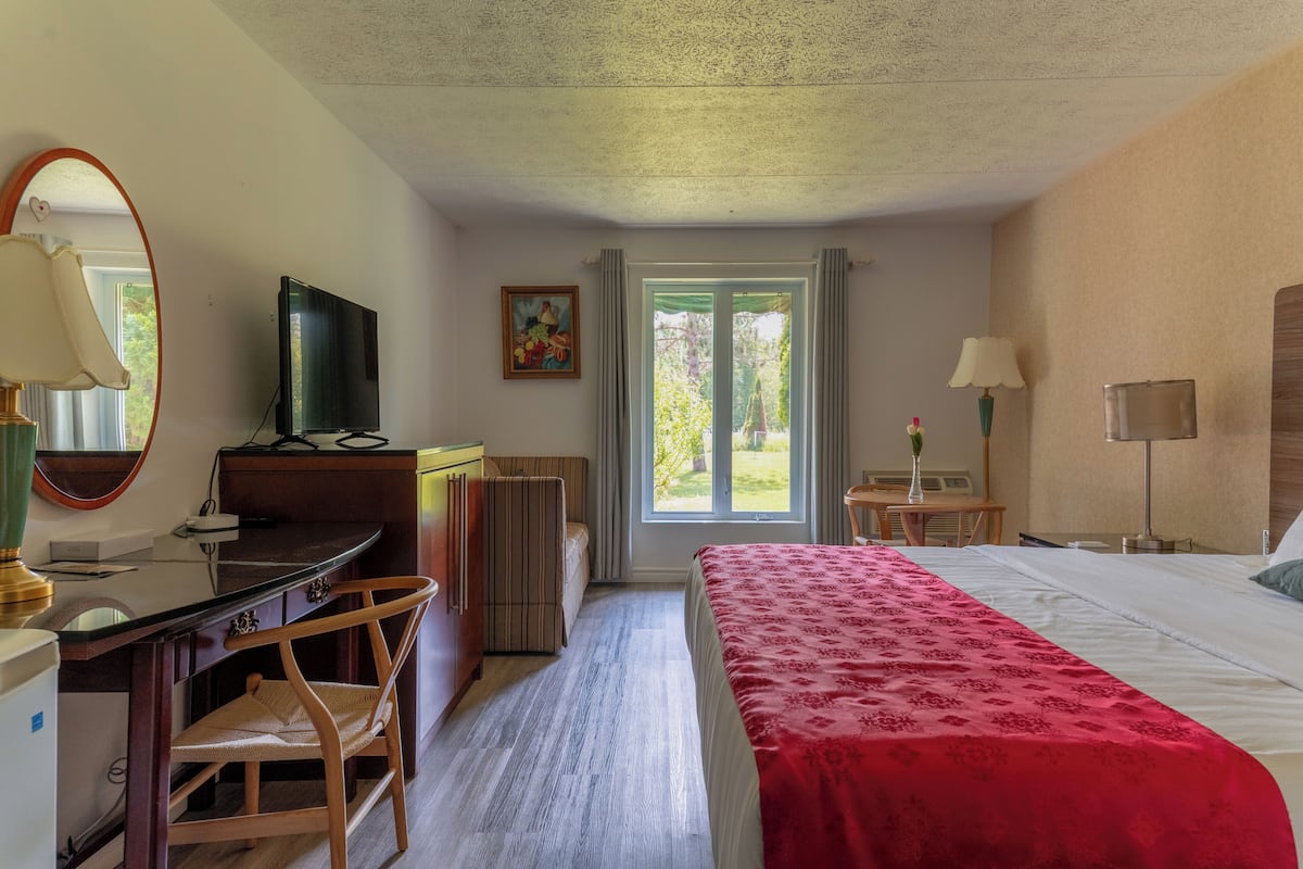 Comfort Double Room, 1 King Bed with Sofa bed | Premium bedding, desk, soundproofing, free WiFi