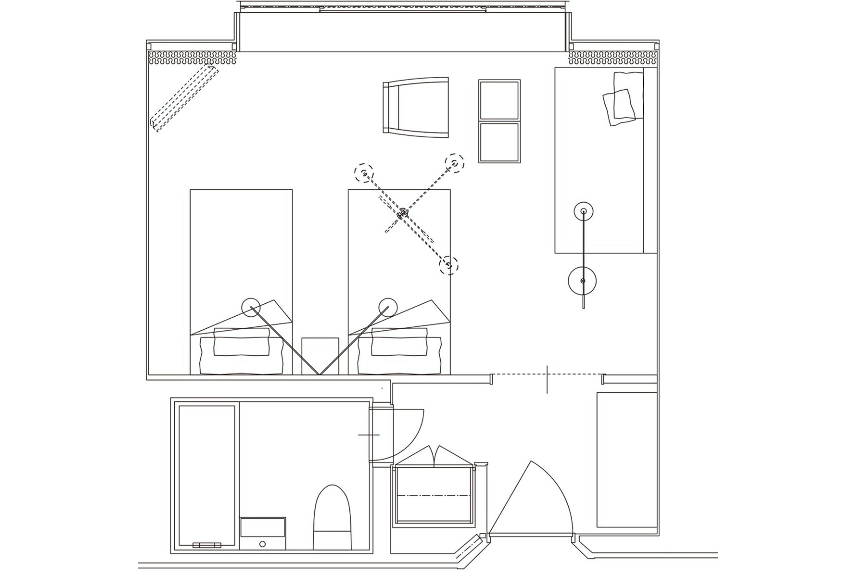 A floor plan of a hotel with multiple rooms, a central hallway, and a dining area.