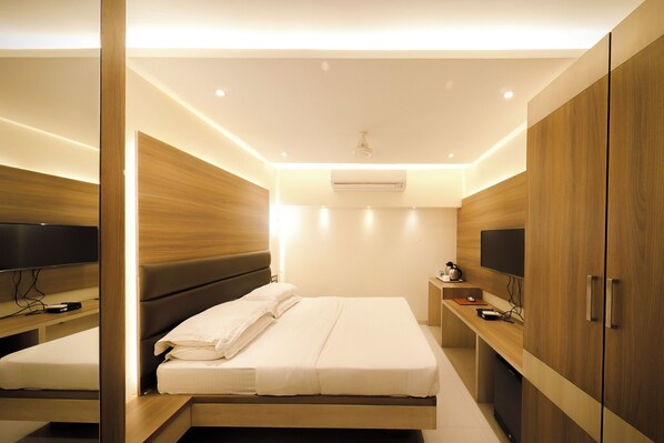 2 dormitorios, caja fuerte, decoración individual y escritorio