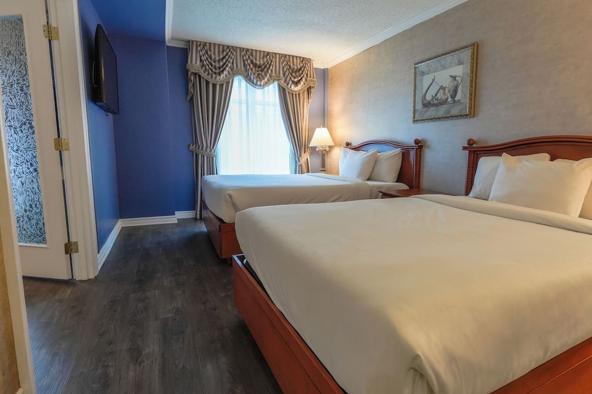 Exterior View Family Suite, 2 Queen and 1 sofa bed | Memory foam beds, in-room safe, desk, blackout drapes